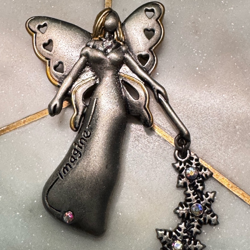 Enchanting Silver Fairy Brooch with Star Details